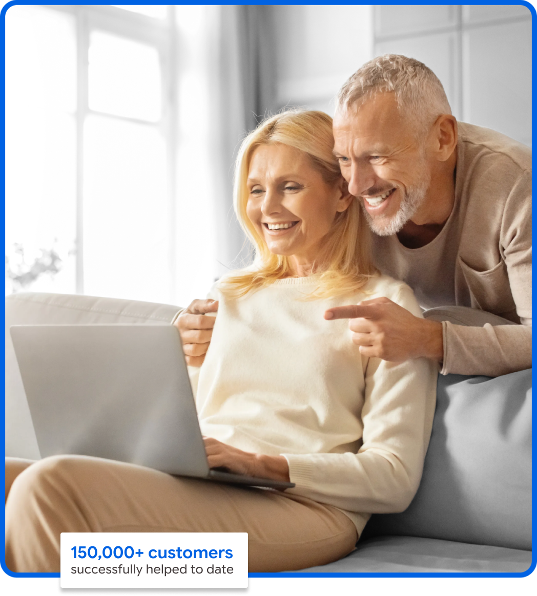 Couple comparing Medicare plans. 150,000+ customers successfully helped to date.